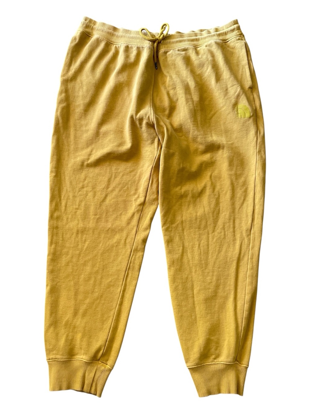 The North Face men’s mustard yellow sweatpants